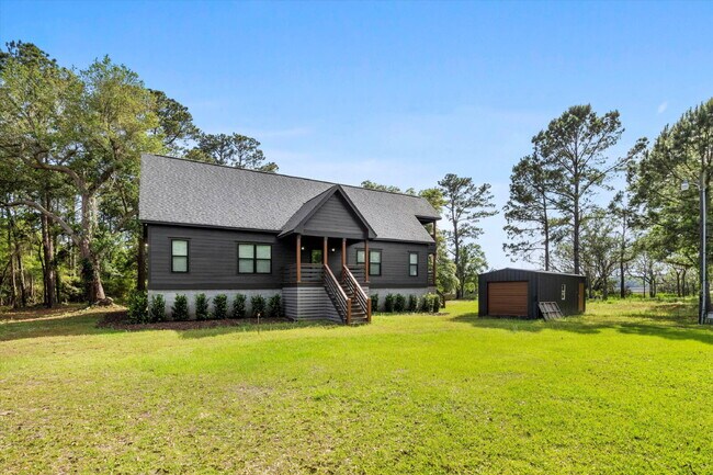 Building Photo - "Spacious 4-Bed Oasis with Guest Suite on Johns Island - Your Dream Home Awaits!"