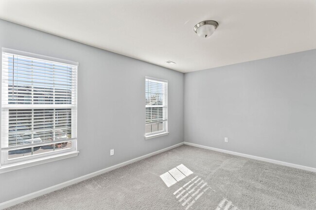 Building Photo - Stunning 4-Bedroom Home with Serene Pond Views