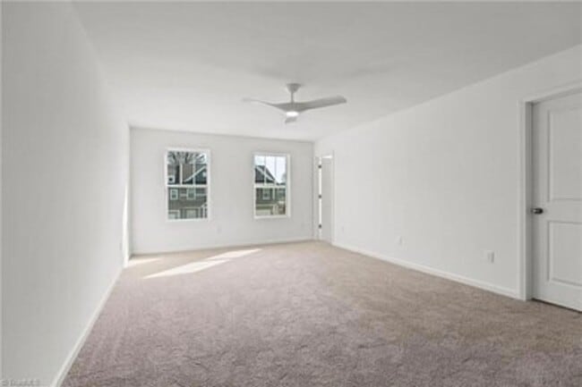 Building Photo - Spacious 3-Bedroom Townhome with Private Patio, Central HVAC & In-Unit Laundry Hookups