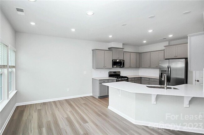 Building Photo - Stunning Almost New Home in desirable Chat...