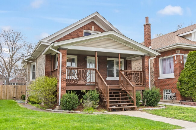 Building Photo - 7938 S Bennett Ave