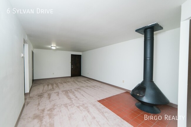 Building Photo - Warm up next to the fire in this 2 bedroom...