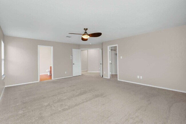 Building Photo - "Spacious 4-Bedroom Sanctuary with 3 Full ...
