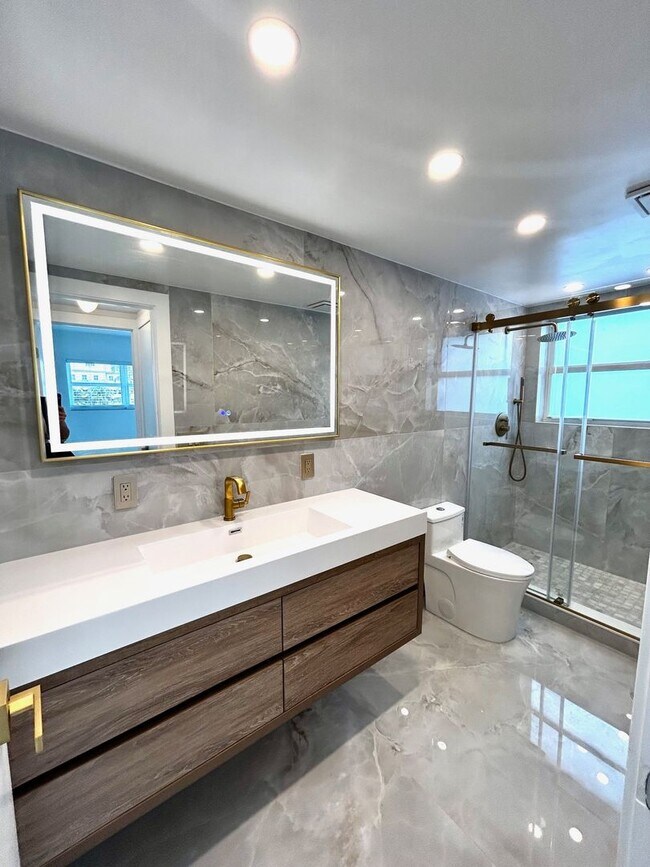 Building Photo - Fully Renovated East-Facing 2BR/2BA + Bonus Room | Ocean Views | In-Unit W/D