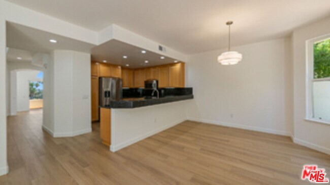 Building Photo - 6465 Zuma View Pl