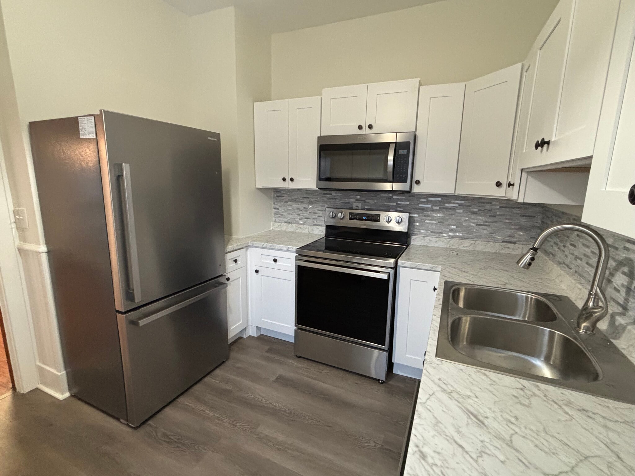 Brand new kitchen -appliances, cabinets, countertop, backsplash - 1003 S Elm Ave