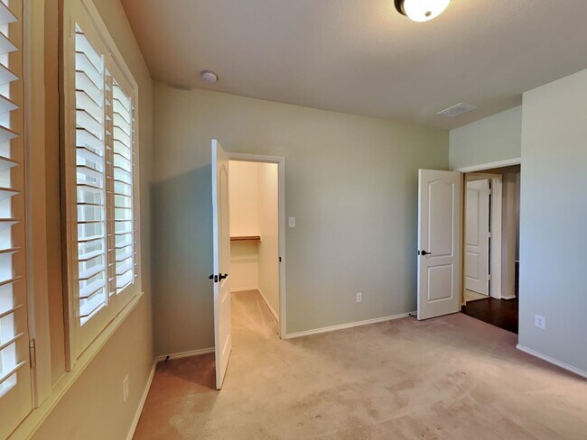 Building Photo - Sophisticated Style, Designer Updates & Gated Community Living