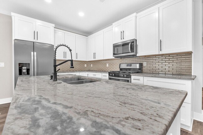 Building Photo - Modern 3 Bedroom Townhome!!