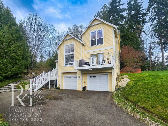 Building Photo - Light-Filled View Home with Vaulted Ceilings & Warm Wood Finishes