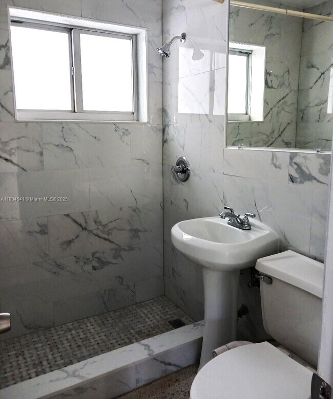 Building Photo - 380 Tamiami Canal Rd