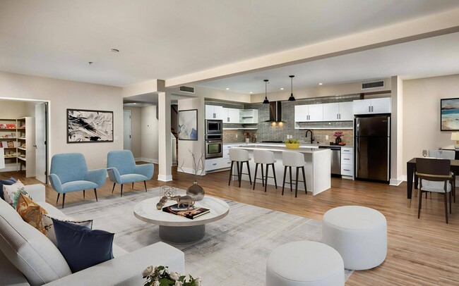 Two seating groups plus a full dining table all fit on one floor. - Venice on Rose