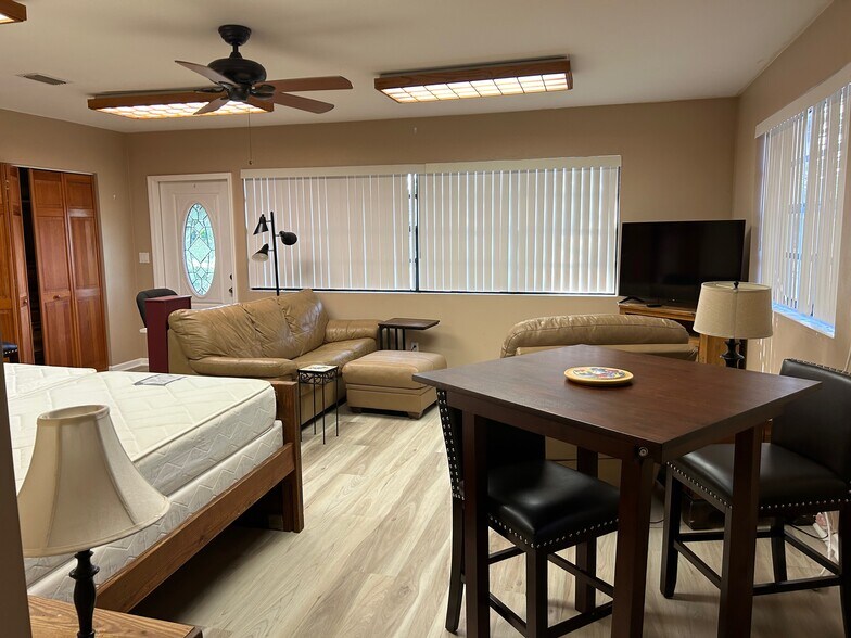 view of living room from kitchen - 630 NW 7th Ave