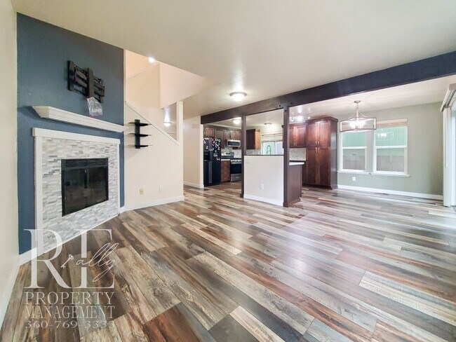 Building Photo - Modernized Two-Story with Open Layout, Gas Fireplace & Large Fenced Yard