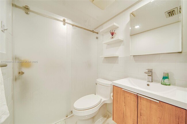 Building Photo - 6767 Collins Ave