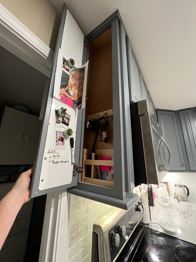 Memo board and key storage cabinet. - 3942 Solano Rd