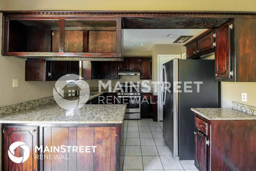 Building Photo - 8405 Bigwood Dr