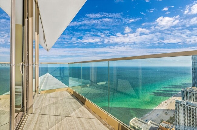 Building Photo - 18975 Collins Ave