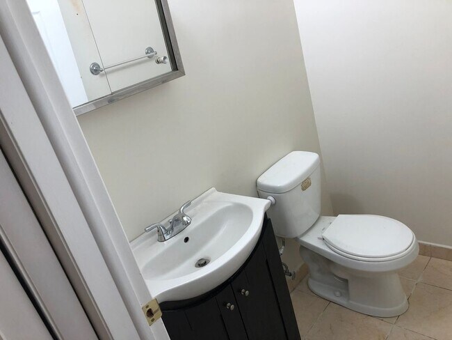 Convenient downstairs half bath - 8315 Karam Blvd