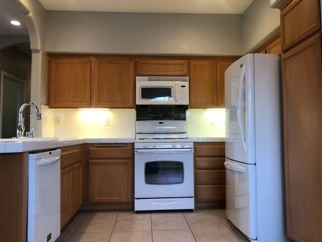 Building Photo - This Mission Creek Village Condo Is A Perfect Place To Call Home!