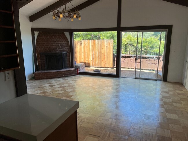 Living room from kitchen. - 2021 Rosilla Pl