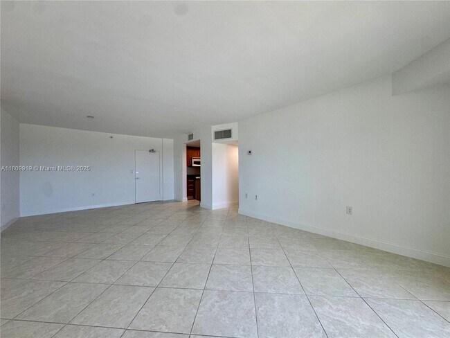 Building Photo - 10275 Collins Ave