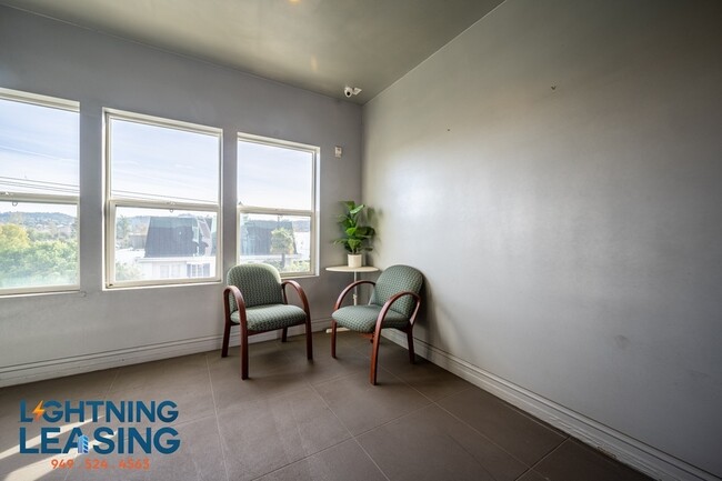 Building Photo - Spacious and stylish two-bedroom with priv...