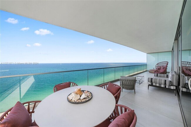 Building Photo - 10203 Collins Ave