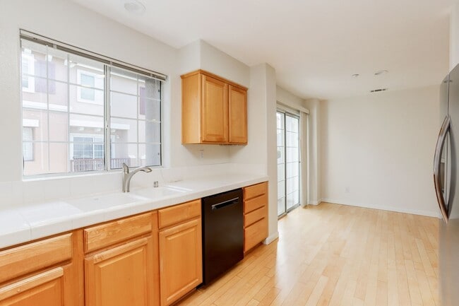 Building Photo - 3 Bed / 2.5 bath, three-level townhome with a bonus home office/den + EV charger in garage. YouTu...