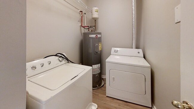 Building Photo - Townhome | Hard Surface Floors Through-Out...