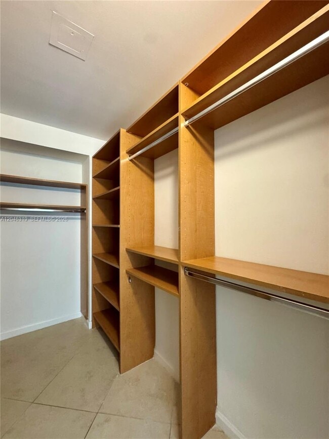 Building Photo - 10275 Collins Ave