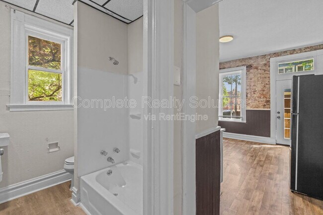 Building Photo - 3402 Dunnica Ave