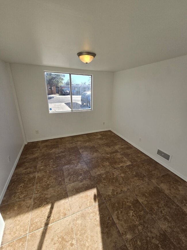 Building Photo - Centrally located in the NE Heights 4 bedroom, 1 3/4 Bath 1900 square feet.