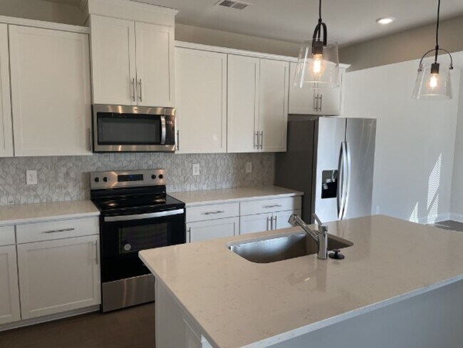 Building Photo - One Year Old, Three Bedroom Two Story in S...