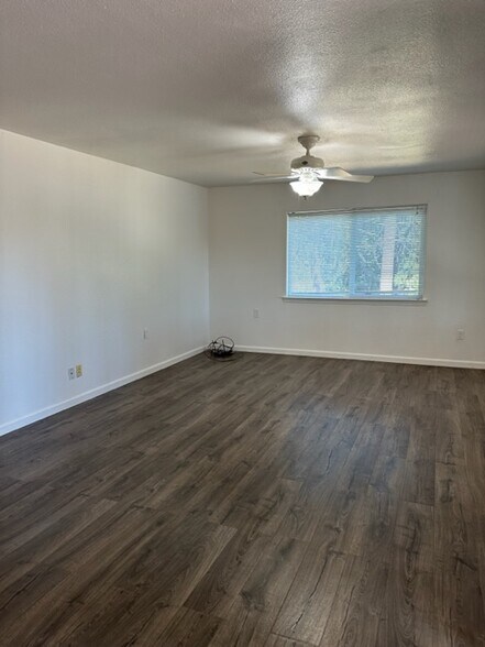 Living room with LVP flooring - 11683 View Dr