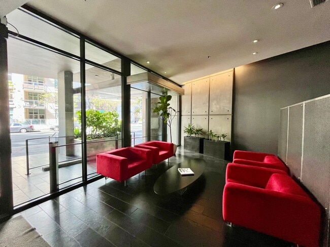 Building Photo - Stunning Corner Loft in East Village with Floor-to-Ceiling Windows & City Views!