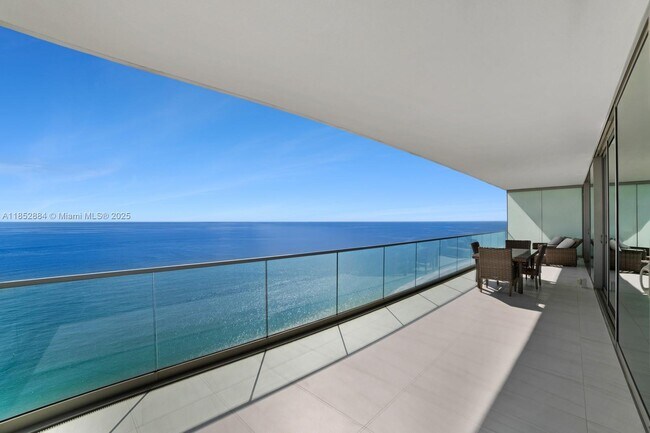 Building Photo - 10203 Collins Ave