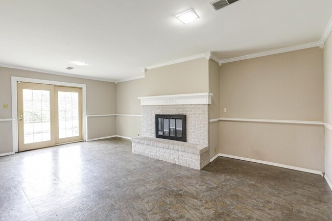 Building Photo - Split-Level Home With Fenced Yard In Quiet Residential Area