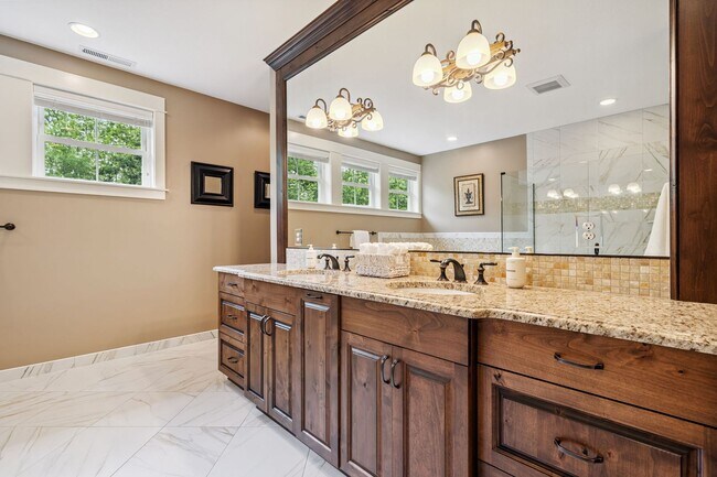 Building Photo - 2 Creeks Condominiums - Gated Community on...
