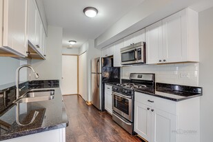 kitchen with granite counters and stainless a - 240 Acorn Dr