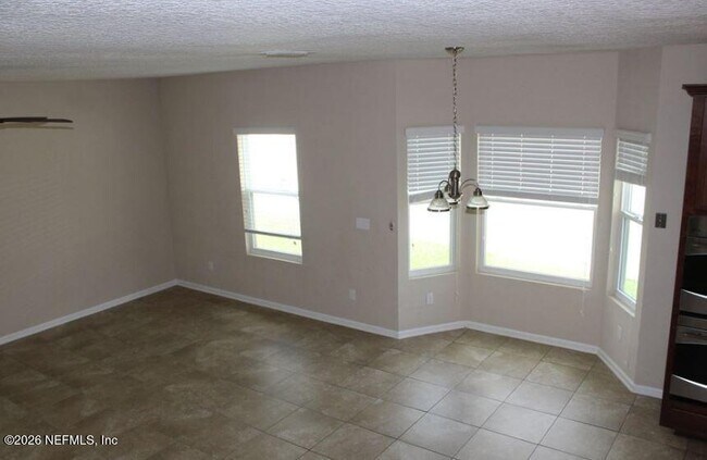 Building Photo - 16404 Magnolia Grove Way