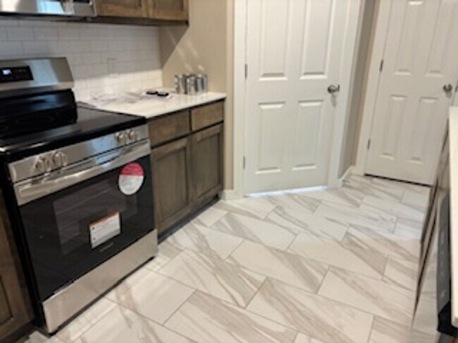 Building Photo - BRAND NEW HOME!  First month free!