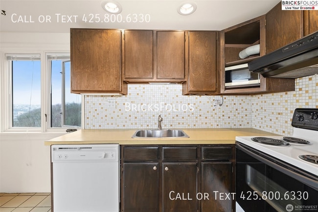 Building Photo - Charming Tudor Retreat: Your Perfect Home ...