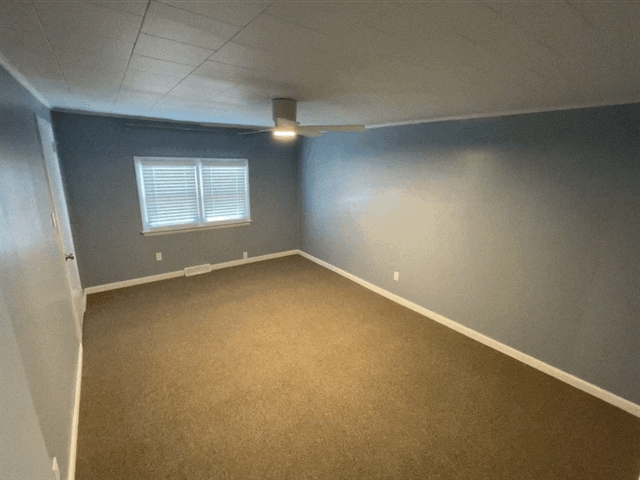 The master bedroom is the master, with a nice long space to fill out. Also has a roomy closet. - 6 Catawba Ave