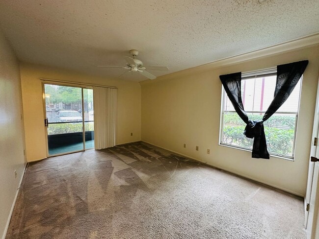 Building Photo - Stunning 1 Bedroom Condo in Pet-Friendly A...