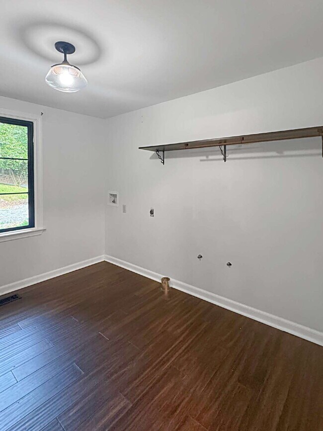 Building Photo - Modern Lake Lanier Retreat | 3BR/3.5BA | Private Swim Dock