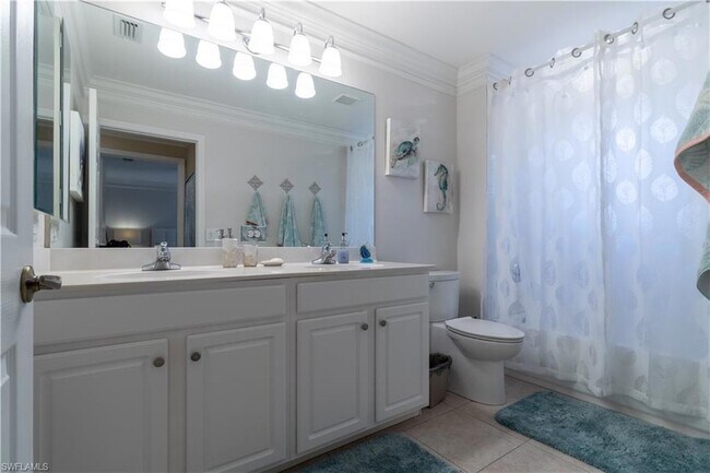 Building Photo - 5655 Lago Villaggio Way