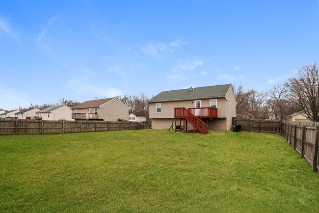 Building Photo - Inviting 4 Bedroom Home