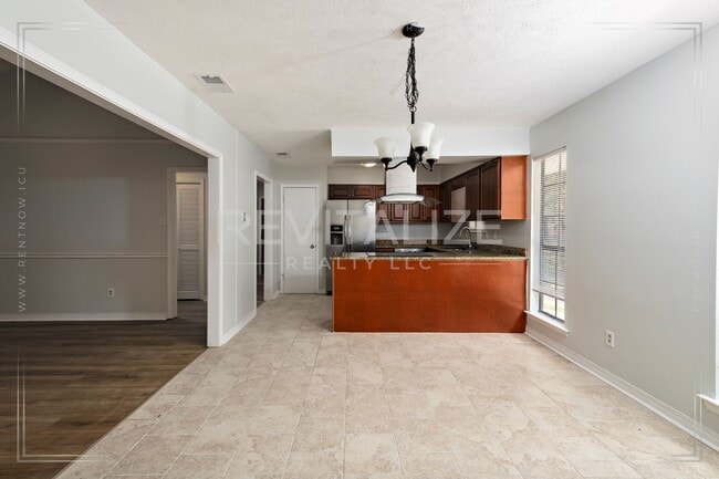 Building Photo - Beautifully Updated 3-Bedroom Home with Granite Kitchen & Sunroom Retreat!