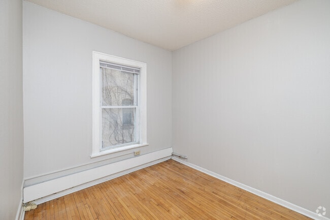 2BR, 1BA - 720SF - Primary Bedroom - 1st Avenue Flats