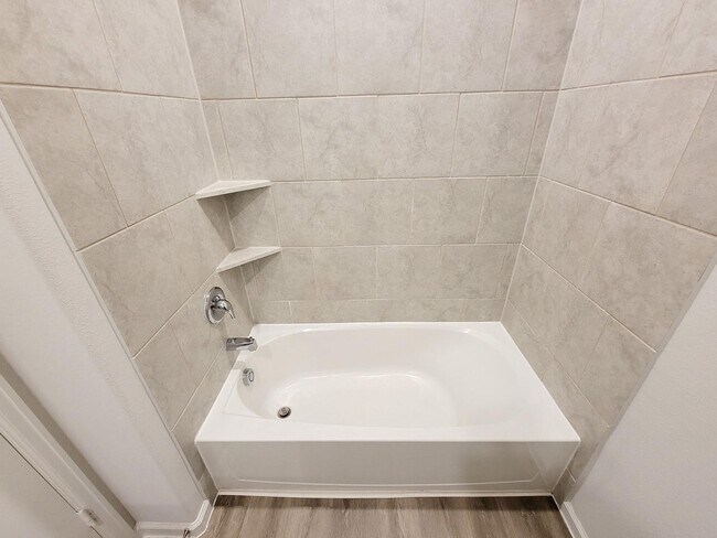 Building Photo - Welcome Home! Your never-lived-in sanctuary awaits your arrival. Have a large household? This 5-b...